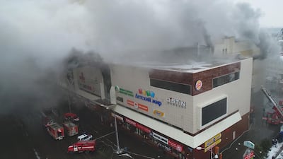 A still photo taken from video provided by Russian Emergencies Ministry shows a site of a fire at a shopping mall in Kemerovo, Russia. Russian Emergencies Ministry / Handout via Reuters