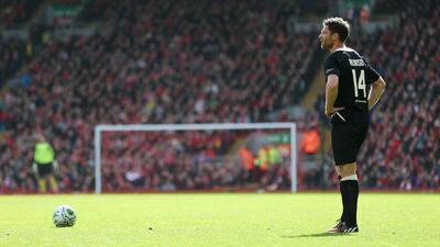Xabi Alonso lines up a free kick. Alex Morton / Reuters