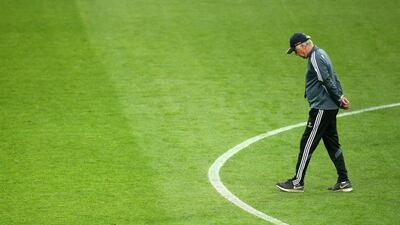 Real Madrid manager Carlo Ancelotti walks the grounds on Monday as he conducts a team training session for the Champions League semi-final first leg against Juventus on Tuesday. Marco Bertorello / AFP