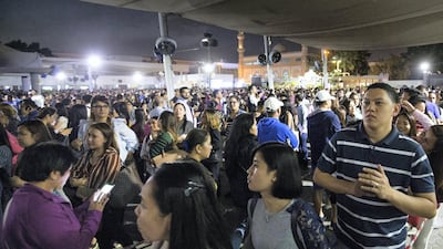 Huge crowds collected their Papal tickets at St. Mary's Church with many queueing later for the overnight transport. Leslie Pableo for The National