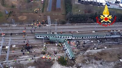 One of the carriages was lying across the track, bent almost at a right angle. Vigili del Fuoco via AP