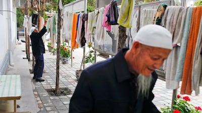 Two Chinese Muslims hang their wet towels after performing ablution. Sarah Dea / The National