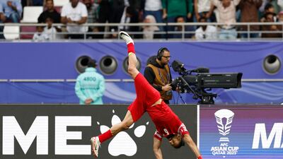 Jordan's Yazan Al Arab celebrates scoring their second to equalise late in the game. Reuters