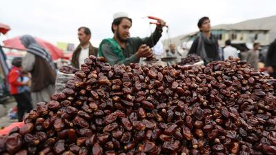 A street vendor sells dates during the Muslim holy month of Ramadan in Kabul, Afghanistan. Rahmat Gul / AP Photo