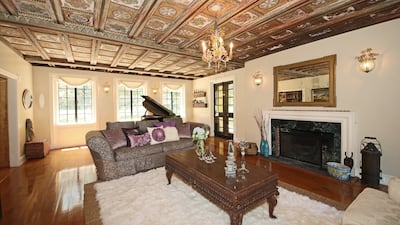 The interiors are brimming with period features, such as this hand-painted coffered ceiling