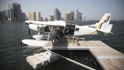 The Seawings charter service offers a 30-minute flight over Sharjah. The tour consists of a water take-off and landing in a Cessna 208 aircraft followed by an open-top bus tour around the city. Lee Hoagland / The National