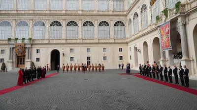 The national anthems are played. AP
