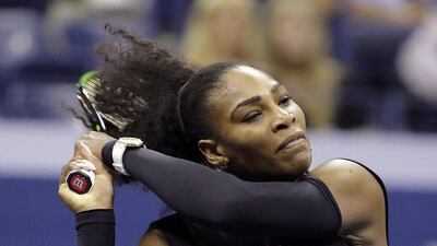 Serena Williams returns a shot during her second round match at the US Open on Thursday. Darron Cummings / AP Photo / September 1, 2016