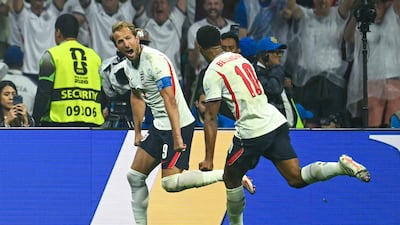 England captain Harry Kane celebrates scoring his team's third goal in the 3-2 win over Mexico in Mexico City. AFP