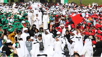The Dubai Ruler and his daughter Sheikha Al Jalila attend a flag-raising ceremony in Zabeel Park.