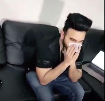 The suspect sneezed and blew his nose into what appeared to be a Dh500 note