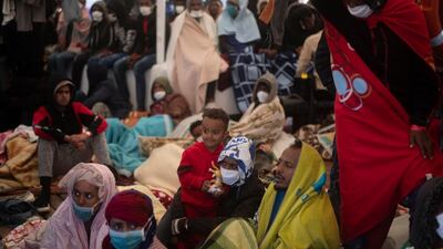 Some 12,000 migrants were rescued at sea and returned to Libya in 2020. AP