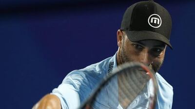 epa05069177 James Blake of Philippine Mavericks in action against Goran Ivanisevic of OBI UAE Royals during their match of the International Premier Tennis League (IPTL) at Dubai Duty Free Tennis Stadium in Dubai, United Arab Emirates on 14 December 2015. EPA/ALI HAIDER