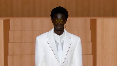 A look combines basketball shorts and a tailored jacket for spring/summer 2022, Louis Vuitton menswear, by Virgil Abloh. Photo: Louis Vuitton