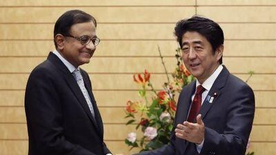 India's finance minister Palaniappan Chidambaram, left, meets with Japan's prime minister Shinzo Abe at Abe's official residence in Tokyo.