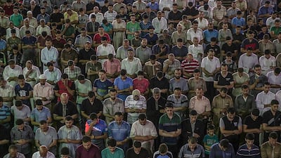 Palestinians pray at the al-Omari mosque during Laylat Al Qadr in Gaza City, on June 12, 2018. Mohammed Saber / EPA