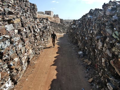 Stacks of compacted scrap metal at a junkyard in the town of Batabu, in north-west Syria. AFP