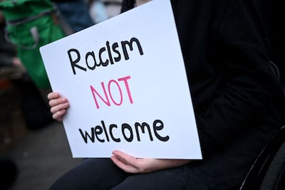A counter-demonstrator against anti-immigration protests in Oxford. AFP