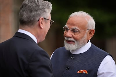 Britain's Prime Minister Keir Starmer welcomes Indian Prime Minister Narendra Modi. Reuters