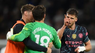 Ruben Dias celebrates with Stefan Ortega after Manchester City's victory. Getty Images