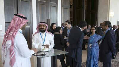 Attendees during a break at the International Renewable Energy Agency assembly. Silvia Razgova / The National