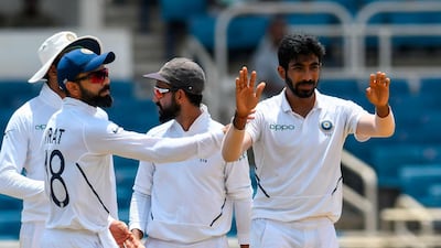 Captain Virat Kohli, left, said India are 'really lucky' to have Jasprit Bumrah, right, on their team after the bowler's superb performance in the West Indies. AFP