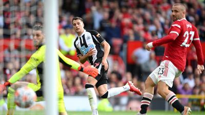 Javier Manquillo scores for Newcastle against Manchester United. Getty