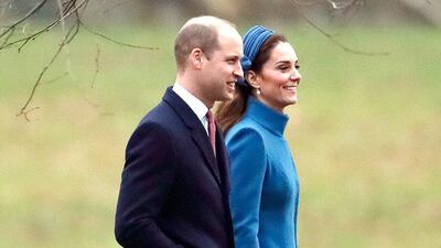 The Duchess of Cambridge wears a blue Catherine Walker coat, an LK Bennett dress, Jane Taylor headband, Jimmy Choo clutch and Kiki McDonough hoops, as she arrives at church in Sandringham with fellow royals on January 6. Getty Images