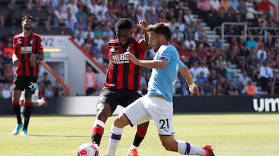 Bournemouth's Jefferson Lerma in action with Manchester City's David Silva. Reuters