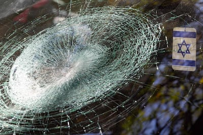 A vehicle bears the scars of an Iranian attack on Tel Aviv. AFP