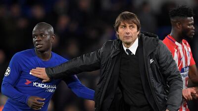 Chelsea manager Antonio Conte, right, fears N'Golo Kante will never win the Ballon d'Or. Toby Melville / Reuters