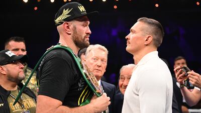 Tyson Fury and Oleksandr Usyk face off in the ring after Fury's win over Francis Ngannou. Getty