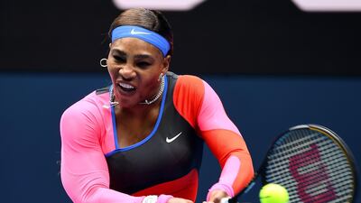 Serena Williams hits a return against Laura Siegemund during her first-round match at the Australian Open. AFP