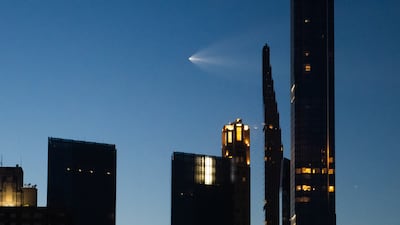 A SpaceX Falcon 9 shortly after being launched from Cape Canaveral creates a 'jellyfish' cloud effect as it passes over New York City. Getty Images