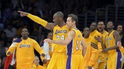 Kobe Bryant (24) will have to get used to newly acquired Steve Nash (10) being the Lakers' primary ball-handler this season.