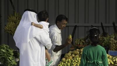 Fujairah, United Arab Emirates, Jul 10, 2014 - Fujairah residents visit a market to buy traditional Food and sweets. Jaime Puebla / The National