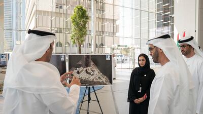 Sheikh Mohamed bin Zayed, Crown Prince of Abu Dhabi and Deputy Supreme Commander of the UAE Armed Forces (second right) tours the new expansion and development work at the Abu Dhabi National Oil Company (ADNOC) Headquarters. He is seen with Dr Sultan Al Jaber, UAE Minister of State, Chairman of Masdar and CEO of ADNOC Group (right). Hamad Al Kaabi / Ministry of Presidential Affairs