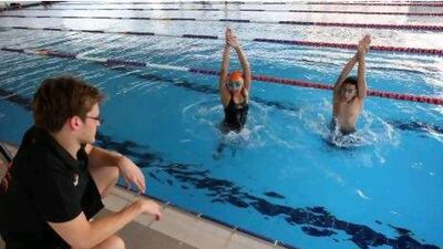 Velimir Stjepanovic, pictured here with Alia Al Shamsi and her brother Abdullah, says there is no excuse not to have world-class swimmers in the UAE.