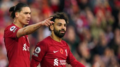 Darwin Nunez celebrates the third with Mohamed Salah. PA
