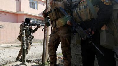 Iraqi Special Operations Forces (ISOF) are seen during an operation to clear the al-Andalus district of Islamic State militants, in Mosul, Iraq. Muhammad Hamed / Reuters