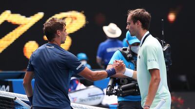 Daniil Medvedev, right, of Russia shakes hands with Henri Laaksonen of Switzerland after winning his first round match on Tuesday. Getty
