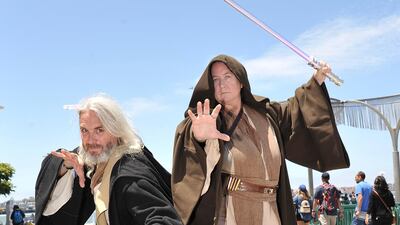 Paul Primose, left, and Joyce Primose, of San Diego, are dressed as characters from "Star Wars." AP Photo