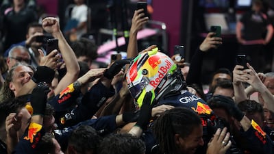 Sergio Perez and Red Bull Racing celebrate in parc ferme. Getty
