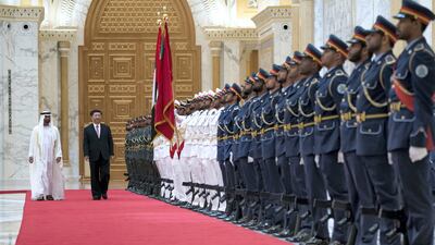 President Sheikh Mohamed bin Zayed and Xi Jinping, President of China, inspect an Armed Forces honour guard during a reception at the Presidential Palace in July 2018. Oil is central to the UAE's economic partnership with China. Crown Prince Court - Abu Dhabi