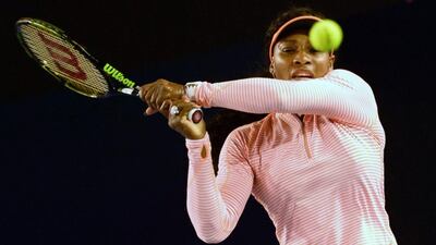 Serena Williams struggles as she takes part in a practice session ahead of the Australian Open on Wednesday. Paul Crock / AFP