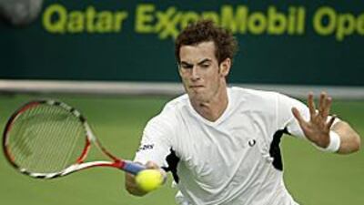 Britain's Andy Murray returns the ball during his victory against Albert Montanes during the ATP Qatar tennis open in Doha. The Scotsman is targeting his first grand slam this year.