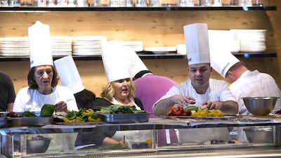 Pascal Sfara, Chef De Cuisine at Amalfi restaurant at the Le Royal Meridien hotel, works with guests. Silvia Razgova / The National