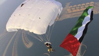 A Twitter picture of a parachuter flying the UAE flag. Courtesy Dubai media office