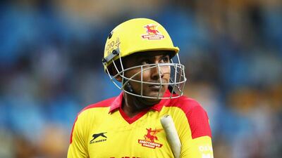 DUBAI, UNITED ARAB EMIRATES - JANUARY 29: Mahela Jayawardene of Sagittarius Strikers walks back after being dismissed for 69 runs by Jacob Oram of Virgo Super Kings during the Oxigen Masters Champions League 2016 match between Virgo Super Kings and Sagittarius Strikers at Dubai International Cricket Stadium on January 29, 2016 in Dubai, United Arab Emirates. (Photo by Francois Nel/Getty Images)