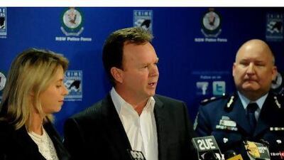 Bill Pulver, centre, spoke about his daughter's ordeal at a press conference in Sydney yesterday. Greg Wood/ AFP